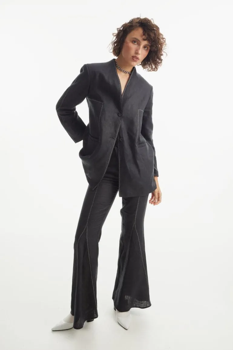 Pants<CULT MIA BLACK ZIG-ZAG FLARE PANTS Black with yellow zig-zag lines